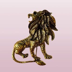 Gold-Tone Lion Brooch w/ Emerald Colored Gem Eye